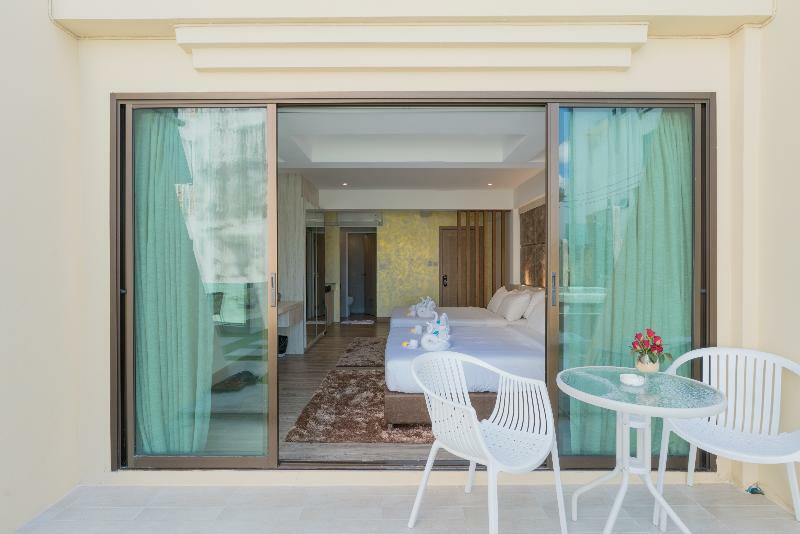Patong Swiss Hotel Beach Front Phuket Exterior photo